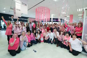 Boundary Outlet Colne staff giving a big BRAvo! for breast cancer charities.