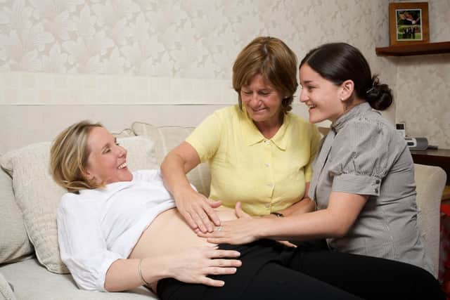 Sheena Byrom with her midwife daughter Anna lend their expertise to an expectant mum