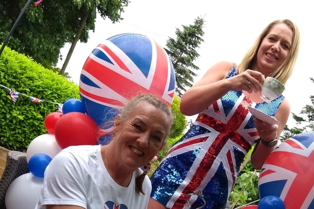 Jacquie Ashton (front) and Lorraine Capstick were among the many people celebrating the platinum jubilee in Sabden