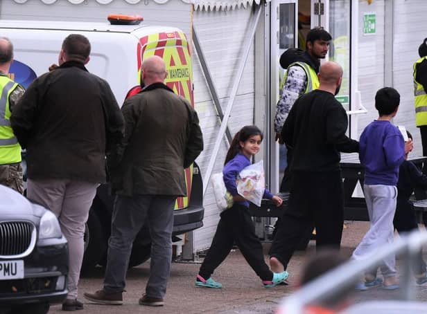<p>Detainees are seen inside the Manston holding centre for asylum seekers. Immigration minister Robert Jenrick this week vowed "more radical" policies to counter illegal migration.</p>