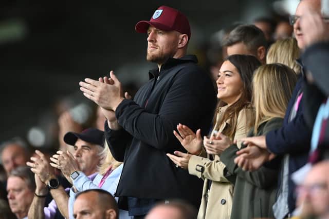 BURNLEY, ENGLAND - MAY 08: NFL legend and Burnley FC stakeholder JJ Watt watches the match with wife Kealia during the Sky Bet Championship between Burnley and Cardiff City at Turf Moor on May 08, 2023 in Burnley, England. (Photo by Gareth Copley/Getty Images)