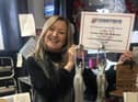 Gift shop owner Andrea Pinder is a dedicated charity champion too