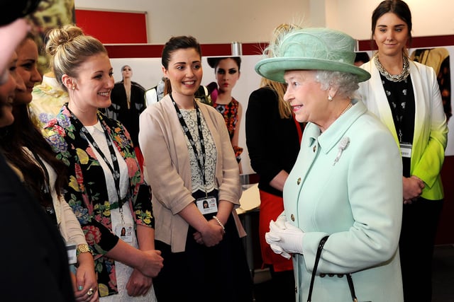Her Majesty Queen Elizabeth and Prince Philip visit The UCLAN Burnley Campus as part of their Diamond Jubilee tour of the country. The Queen chats to fashion students.  Picture by Paul Heyes, Wednesday May 16, 2012.