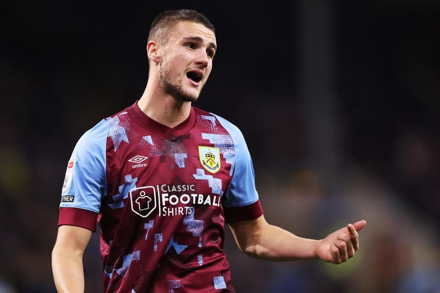 BURNLEY, ENGLAND - OCTOBER 25: Taylor Harwood-Bellis of Burnley reacts during the Sky Bet Championship between Burnley and Norwich City at Turf Moor on October 25, 2022 in Burnley, England. (Photo by Nathan Stirk/Getty Images)