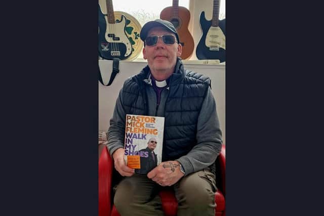 Pastor Mick Fleming, founder of Burnley's Church on the Street, with his new book Walk in My Shoes.
