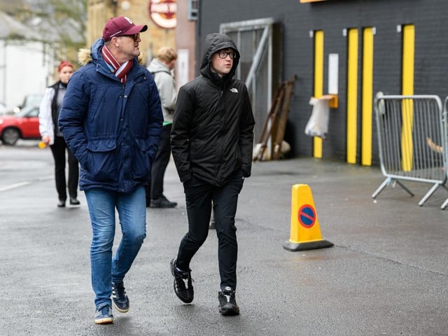 Burnley fans arrive at Turf Moor for the Premier League fixture against West Ham United. Photo: Kelvin Lister-Stuttard
