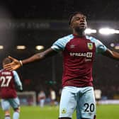 BURNLEY, ENGLAND - APRIL 06:  Maxwel Cornet of Burnley celebrates after scoring their team's third goal during the Premier League match between Burnley and Everton at Turf Moor on April 06, 2022 in Burnley, England. (Photo by Clive Brunskill/Getty Images)