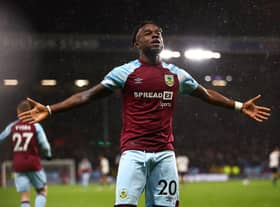 BURNLEY, ENGLAND - APRIL 06:  Maxwel Cornet of Burnley celebrates after scoring their team's third goal during the Premier League match between Burnley and Everton at Turf Moor on April 06, 2022 in Burnley, England. (Photo by Clive Brunskill/Getty Images)