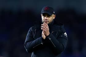 BRIGHTON, ENGLAND - DECEMBER 09: Vincent Kompany, Manager of Burnley, applauds the fans after the Premier League match between Brighton & Hove Albion and Burnley FC at American Express Community Stadium on December 09, 2023 in Brighton, England. (Photo by Bryn Lennon/Getty Images)