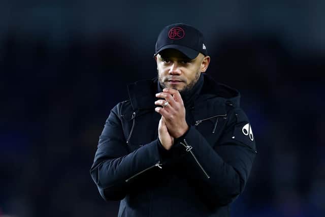 BRIGHTON, ENGLAND - DECEMBER 09: Vincent Kompany, Manager of Burnley, applauds the fans after the Premier League match between Brighton & Hove Albion and Burnley FC at American Express Community Stadium on December 09, 2023 in Brighton, England. (Photo by Bryn Lennon/Getty Images)