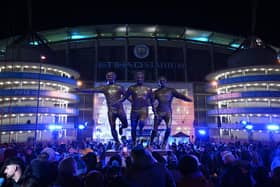 MANCHESTER, ENGLAND - NOVEMBER 28: A general view of the newly unveiled statute of Colin Bell, Francis Lee and Mike Summerbee in front of the stadium prior to the UEFA Champions League match between Manchester City and Rb Leipzig at Etihad Stadium on November 28, 2023 in Manchester, England. (Photo by Shaun Botterill/Getty Images)