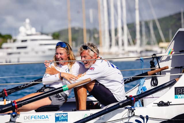 Emma and fellow rower John at the finish line.