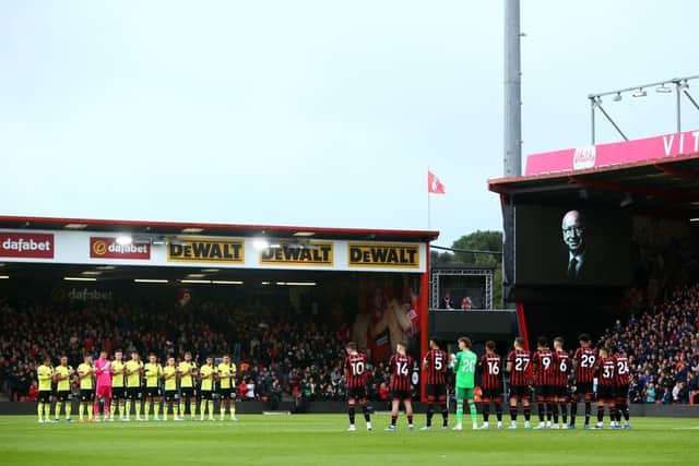BOURNEMOUTH, ENGLAND - OCTOBER 28: Players from both teams stand for a minutes applause in memory of Sir Bobby Charlton during the Premier League match between AFC Bournemouth and Burnley FC at Vitality Stadium on October 28, 2023 in Bournemouth, England. (Photo by Charlie Crowhurst/Getty Images)