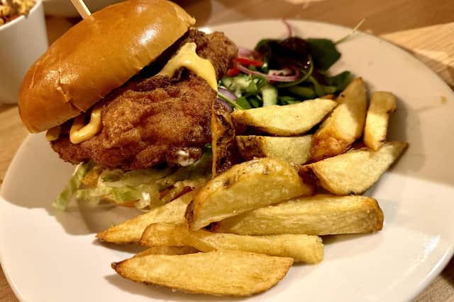 Southern fried chicken burger with chunky chips.