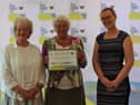 Members of the Gawthorpe National Trust team show off their award with Katherine Bates, of the South Pennines Park.