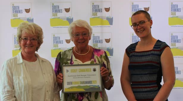 Members of the Gawthorpe National Trust team show off their award with Katherine Bates, of the South Pennines Park.