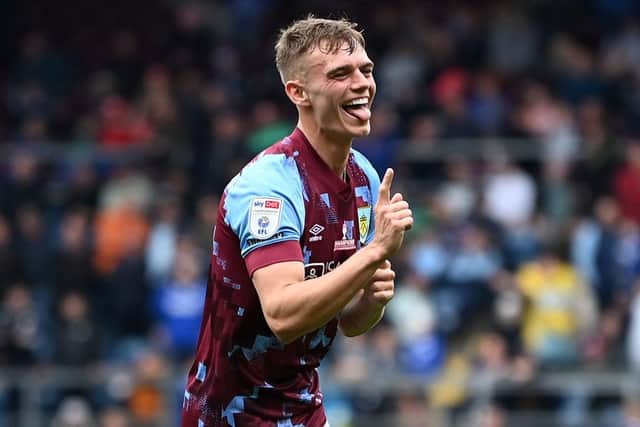 BURNLEY, ENGLAND - MAY 08: Scott Twine of Burnley celebrates after scoring the team's third goal from a free kick during the Sky Bet Championship between Burnley and Cardiff City at Turf Moor on May 08, 2023 in Burnley, England. (Photo by Gareth Copley/Getty Images)