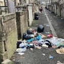 The rotting rubbish In the back alley behind Ribbledale Street and Bar Street In the Bank Hall district of Burnley