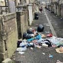 The rotting rubbish In the back alley behind Ribbledale Street and Bar Street In the Bank Hall district of Burnley