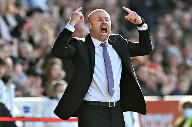 Burnley's English manager Sean Dyche gestures on the touchline during the English Premier League football match between Brentford and Burnley at Brentford Community Stadium in London on March 12, 2022.