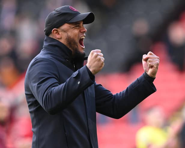 SHEFFIELD, ENGLAND - APRIL 20: Burnley manager Vincent Kompany celebrates with fans after the Premier League match between Sheffield United and Burnley FC at Bramall Lane on April 20, 2024 in Sheffield, England. (Photo by Stu Forster/Getty Images)