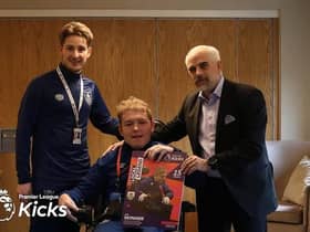 Burnley’s MP Antony Higginbotham has teamed up with local disability champion Joe Skinner (pictured here with Burnley FC chairman Alan Pace) to improve wheelchair accessibility on buses
