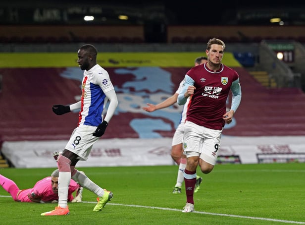 Burnley's New Zealand striker Chris Wood (R) celebrates after scoring the opening goal of the English Premier League football match between Burnley and Crystal Palace at Turf Moor in Burnley, north west England on November 23, 2020. (Photo by Jan Kruger / POOL / AFP) / RESTRICTED TO EDITORIAL USE. No use with unauthorized audio, video, data, fixture lists, club/league logos or 'live' services. Online in-match use limited to 120 images. An additional 40 images may be used in extra time. No video emulation. Social media in-match use limited to 120 images. An additional 40 images may be used in extra time. No use in betting publications, games or single club/league/player publications. /  (Photo by JAN KRUGER/POOL/AFP via Getty Images)