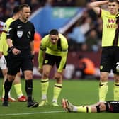 BIRMINGHAM, ENGLAND - DECEMBER 30: Jordan Beyer of Burnley goes down with an injury during the Premier League match between Aston Villa and Burnley FC at Villa Park on December 30, 2023 in Birmingham, England. (Photo by Ryan Pierse/Getty Images)