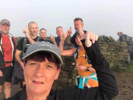 10 photos of Burnley people taking on the Yorkshire Three Peaks Challenge to support those bereaved by suicide.