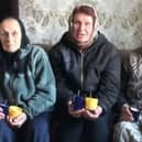 Citizens in Ukraine with Kerax-made candles