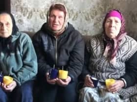 Citizens in Ukraine with Kerax-made candles