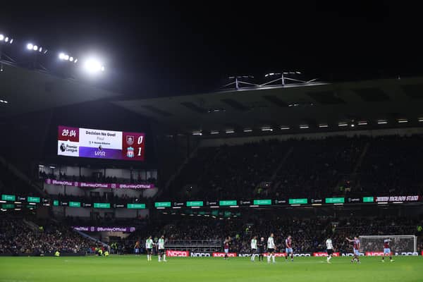 BURNLEY, ENGLAND - DECEMBER 26: A general view inside the stadium as the scoreboard shows that the VAR disallows a goal scored by Cody Gakpo of Liverpool during the Premier League match between Burnley FC and Liverpool FC at Turf Moor on December 26, 2023 in Burnley, England. (Photo by Lewis Storey/Getty Images)