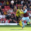 WATFORD, ENGLAND - APRIL 30: Matěj Vydra of Burnley battles with Christian Kabasele of Watford during the Premier League match between Watford and Burnley at Vicarage Road on April 30, 2022 in Watford, England. (Photo by Richard Heathcote/Getty Images)