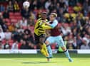 WATFORD, ENGLAND - APRIL 30: Matěj Vydra of Burnley battles with Christian Kabasele of Watford during the Premier League match between Watford and Burnley at Vicarage Road on April 30, 2022 in Watford, England. (Photo by Richard Heathcote/Getty Images)