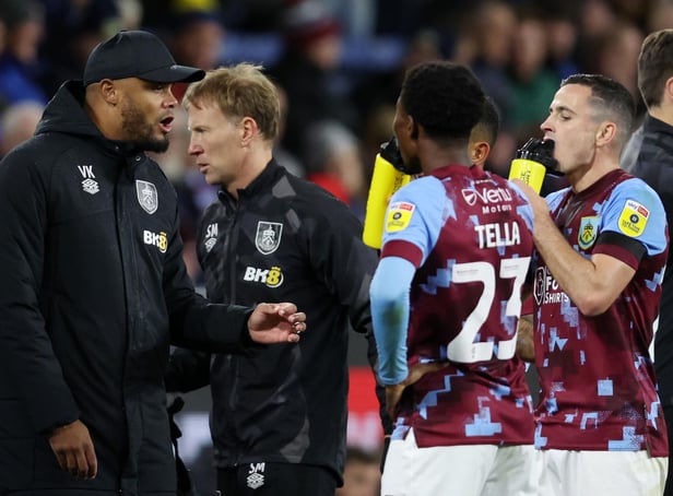 BURNLEY, ENGLAND - OCTOBER 05: Vincent Kompany, Manager of Burnley interacts with their side during the Sky Bet Championship between Burnley and Stoke City at Turf Moor on October 05, 2022 in Burnley, England. (Photo by Clive Brunskill/Getty Images)