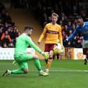 MOTHERWELL, SCOTLAND - OCTOBER 31: Joe Aribo of Rangers shoots whilst under pressure from Liam Kelly of Motherwell during the Cinch Scottish Premiership match between Motherwell FC and Rangers FC at Fir Park on October 31, 2021 in Motherwell, Scotland. (Photo by Ian MacNicol/Getty Images)