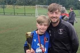 Daniel Buck with his son Jack. Daniel is the manager of Padiham FC under 14's team which has launched an appeal for more players to join the squad