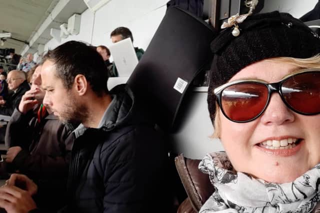 Burnley Express reporter Sue Plunkett on the press bench at Turf Moor watching the Clarets play Blackburn Rovers, with colleagues, videographer Kelvin Stuttard and sports editor Dan Black.