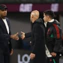 BURNLEY, ENGLAND - SEPTEMBER 23: Manager Erik ten Hag of Manchester United shakes hands with Manager Vincent Kompany of Burnley after the Premier League match between Burnley FC and Manchester United at Turf Moor on September 23, 2023 in Burnley, England. (Photo by Matthew Peters/Manchester United via Getty Images)