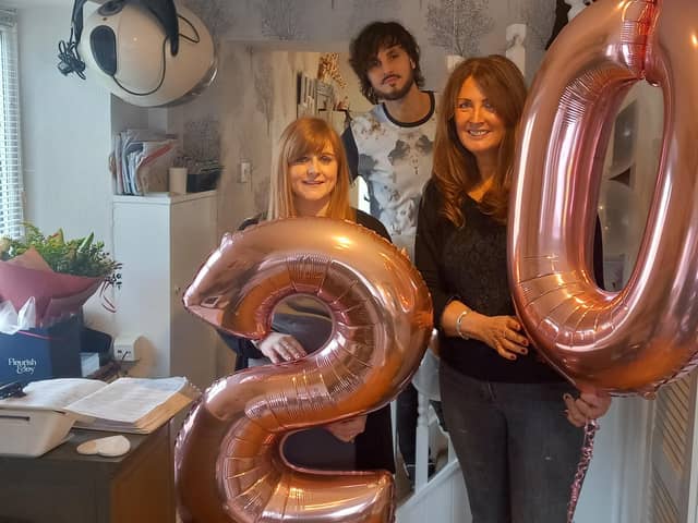 The team at Brierfield salon Hair Junction are celebrating 20 years in business