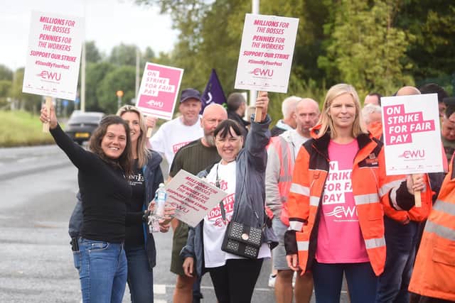 Postal workers on strike outside the Royal Mail delivery office in Bispham. The CWU is in dispute with Royal Mail over a 2 per cent pay offer when bosses at the company got six figure bonuses
