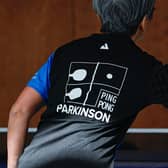 Women play table tennis at the Ping Pong Parkinson initiative in Berlin on April 11, 2023. The World Parkinson's Day takes place on April 11th every year to raise awareness of Parkinson's. The disease is the fastest-growing neurological condition in the world. Being active can help manage Parkinson's symptoms. (Photo by Tobias SCHWARZ / AFP) (Photo by TOBIAS SCHWARZ/AFP via Getty Images)
