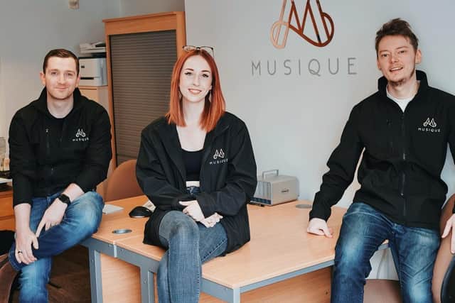 Musique staff (from left) Arthur Phillips, Isabella Baker, and Jamie Turner