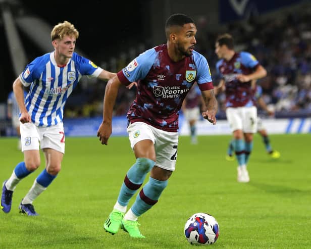HUDDERSFIELD, ENGLAND - JULY 29: Vitinho of Burnley keeps possession of the ball during the Sky Bet Championship match between Huddersfield Town and Burnley at John Smith's Stadium on July 29, 2022 in Huddersfield, England. (Photo by Ashley Allen/Getty Images)