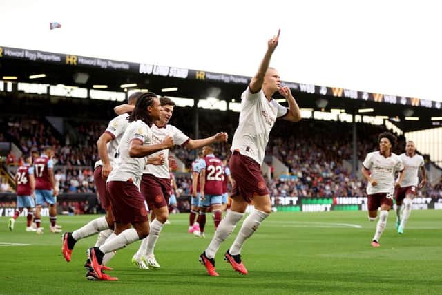 BURNLEY, ENGLAND - AUGUST 11: Erling Haaland of Manchester City celebrates after scoring the team's first goal during the Premier League match between Burnley FC and Manchester City at Turf Moor on August 11, 2023 in Burnley, England. (Photo by Nathan Stirk/Getty Images)