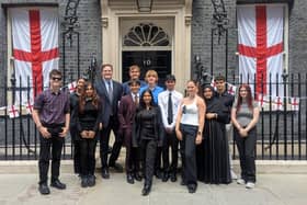 Some of the political 'summer school' students pictured outside Number 10 Downing Street with Oliver Ryan MP