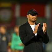 SALFORD, ENGLAND - SEPTEMBER 26: Vincent Kompany, Manager of Burnley, applauds the fans at full-time following the Carabao Cup Third Round match between Salford City and Burnley at Peninsula Stadium on September 26, 2023 in Salford, England. (Photo by Michael Regan/Getty Images)