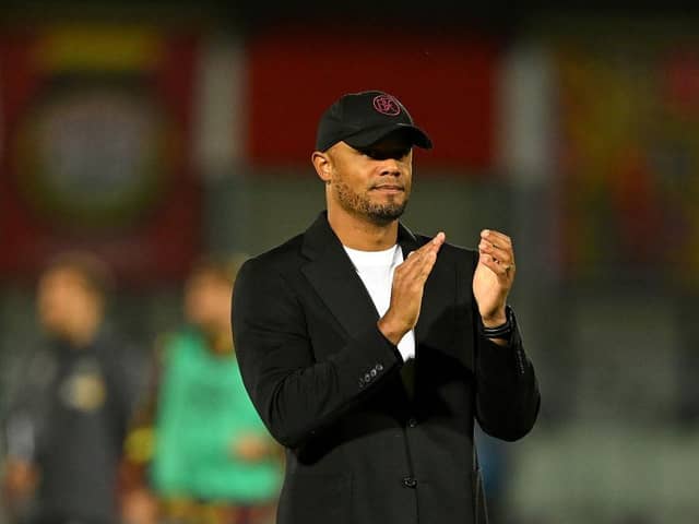 SALFORD, ENGLAND - SEPTEMBER 26: Vincent Kompany, Manager of Burnley, applauds the fans at full-time following the Carabao Cup Third Round match between Salford City and Burnley at Peninsula Stadium on September 26, 2023 in Salford, England. (Photo by Michael Regan/Getty Images)