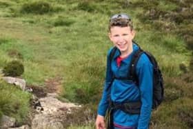 Finlay Hall (14) is planning to ride 100 miles in one day to raise money for Pendleside Hospice