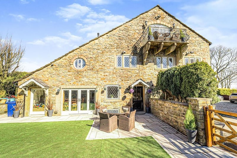 Price: £565,000
Agent: Reeds Rains

This incredibly romantic semi-detached barn conversion boasts five bedrooms and five reception rooms, including a gymnasium and an office.